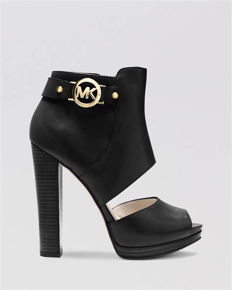 michael kors heels black w buckle|michael kors black high heels.